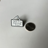 “this is a positive sign” pin